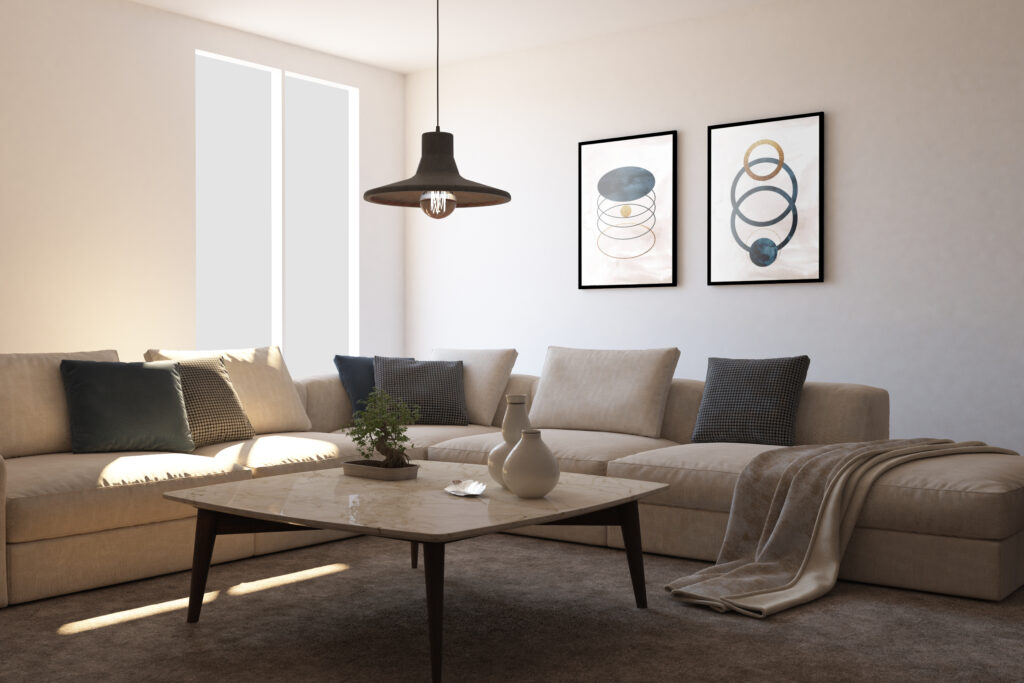 Modernes Wohnzimmer mit Sofa, Kunst an der Wand und Sonnenlicht.